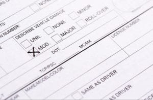 Closeup of vehicle damage form