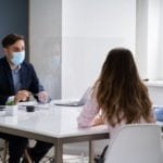 Lawyer discusses coronavirus lawsuit with couple