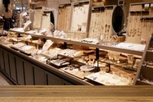 A shelf full of jewelries in a jewelry store