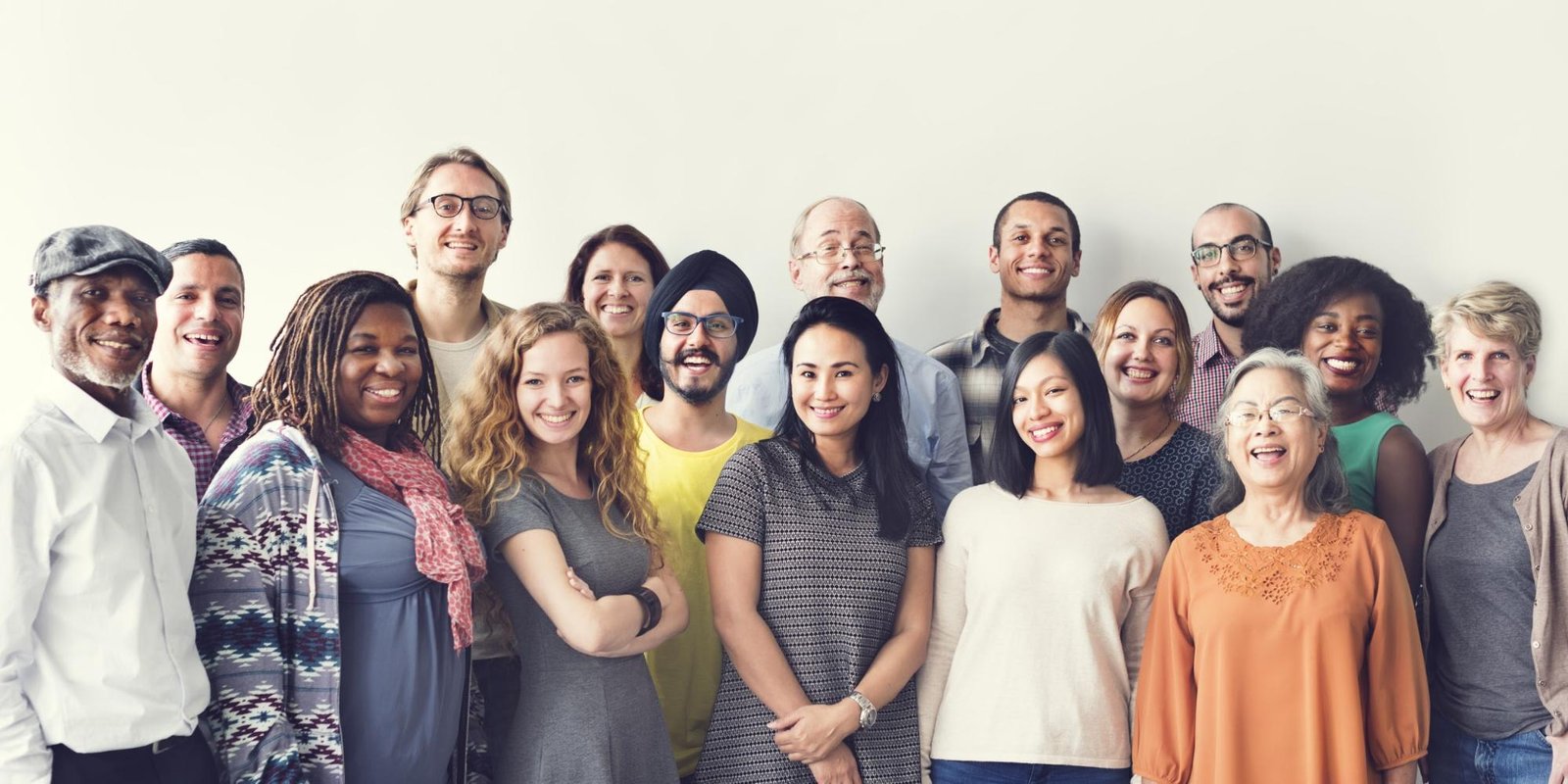 A diverse group of people smiling at the camera