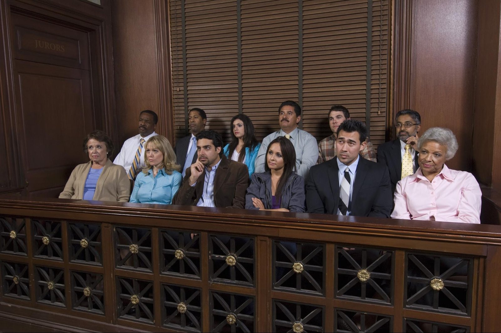 A panel of jurors inside a courtroom