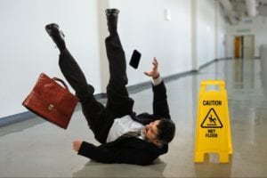 Man slipping on wet floor